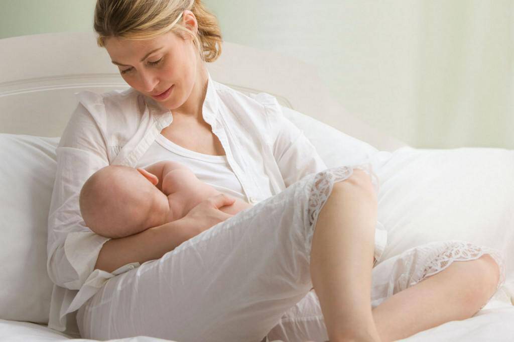 Caucasian-mother-breast-feeding-baby-boy