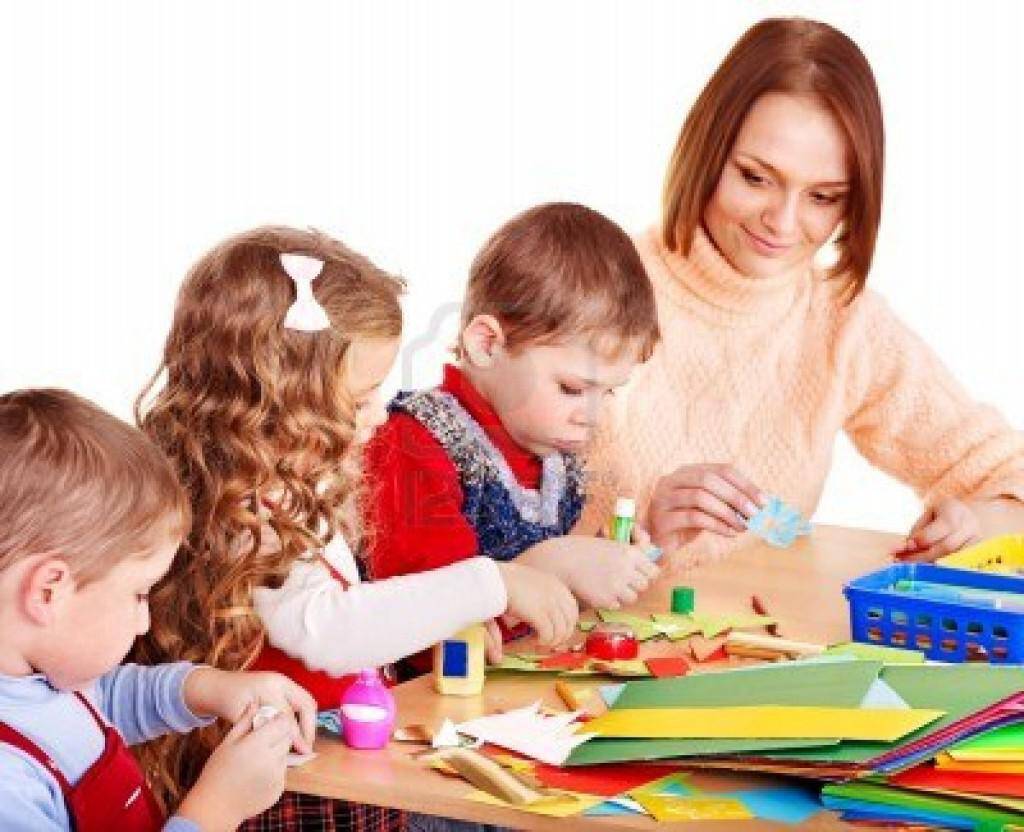 kindergarden-teacher-with-group-children-isolated