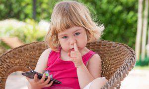 bigstock-Little-Child-With-Mobile-Picki-144999839