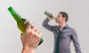 bigstock-Unfocused-Man-Drinking-Alcohol-139649423