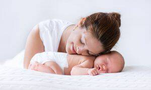 bigstock-Young-Mother-And-Newborn-Baby-98243750