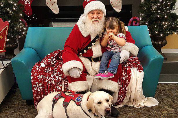sadie-brooks-with-santa-and-hero-the-dog