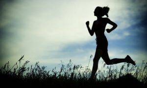 bigstock-Young-woman-running-summer-par-871019181