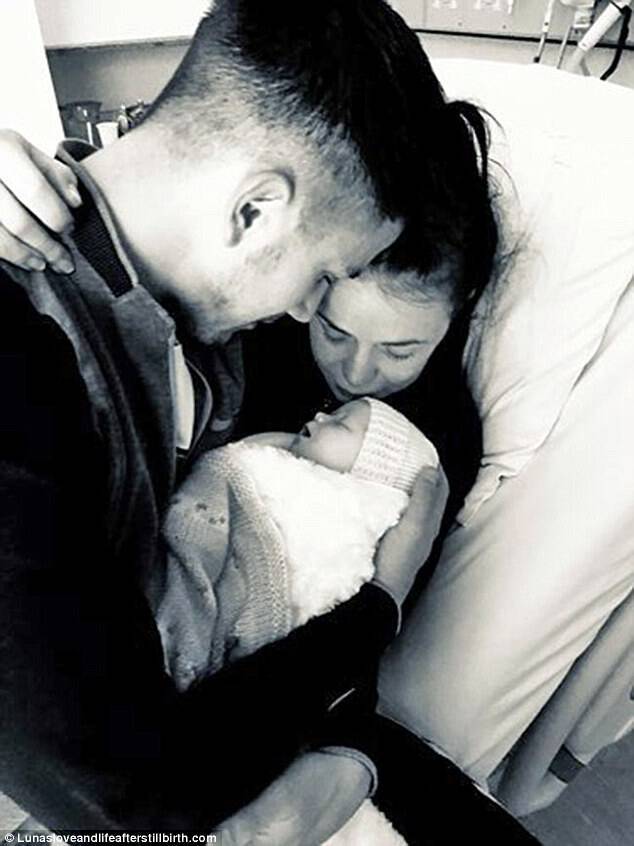 Aimee and her partner Ryan hold baby Luna when they finally got to see her in hospitalÂ 