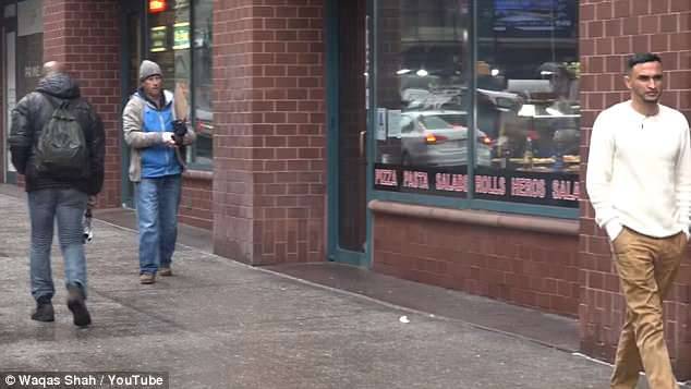 The homeless man calls after its owner and rushes to give it back to him