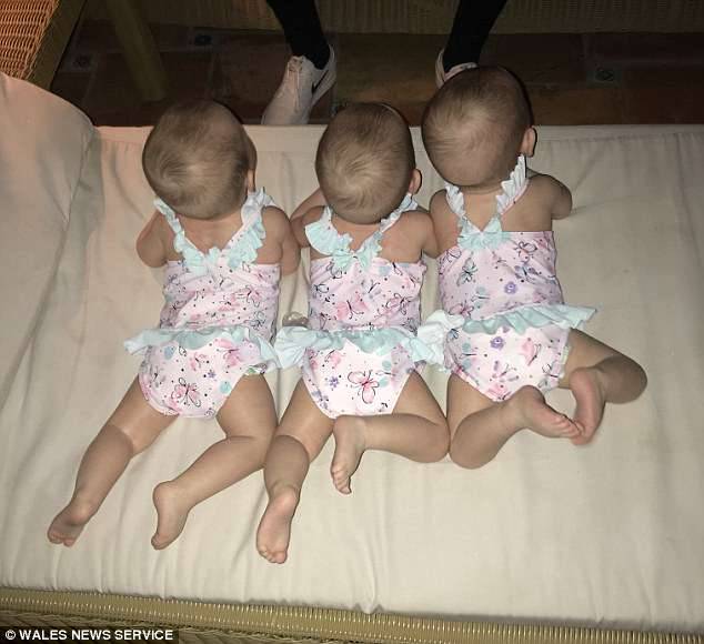 Best friends:Â  Each sister, pictured, will grow up having two people always by their side
