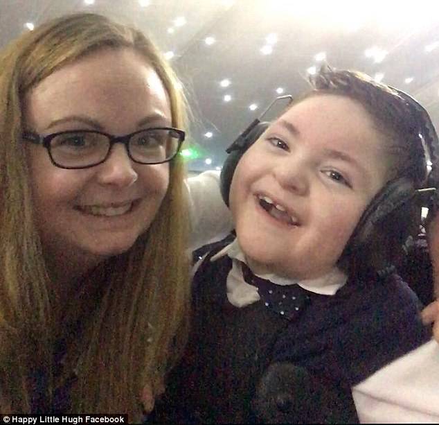 Emma Murphy, (pictured) from Birmingham, bought a 12-week-old Springer Spaniel by the name of Barney for her eight-year-old son Hugh (seen), who suffers with a rare genetic neuro-developmental disorder which severely affects his development.