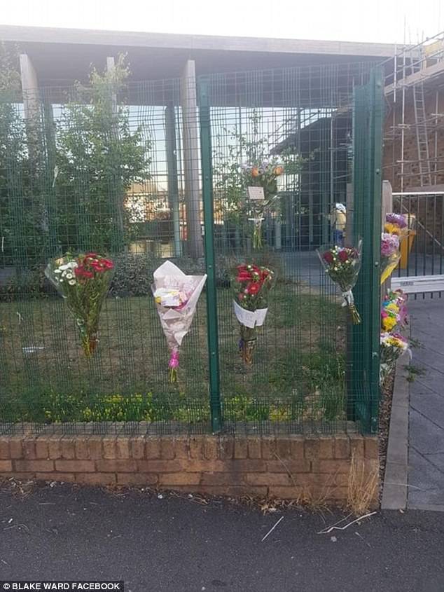 Friends and family of Blake are fundraising to pay for the boy's wake. Pictured: Flowers left as tributes to the 16-year-old