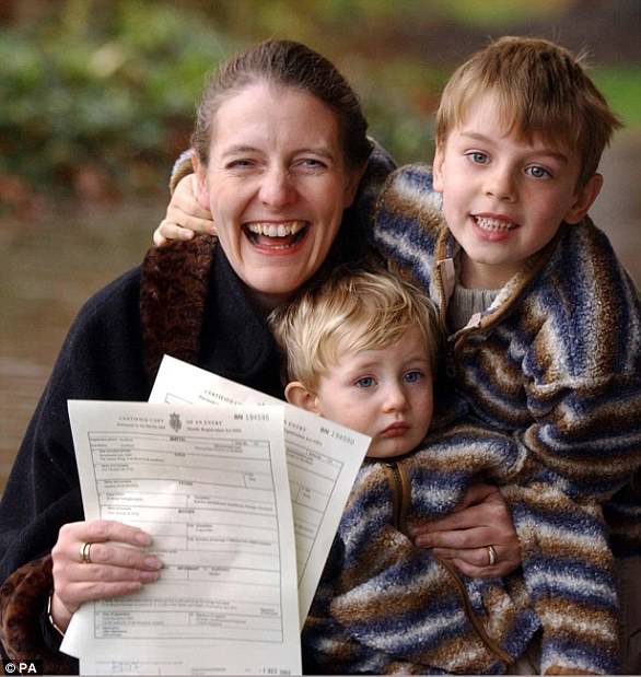 Diane Blood with sons Liam, four, and Joel, 16-months, shows birth certificates bearing the name of their father, outside Sheffield District Register Office in 2003