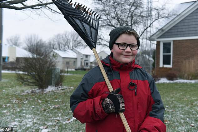Kaleb Klakulak, 12 (pictured), is doing odd jobs and collecting pop bottles to raise money for a headstone for his friend K.J. Gross, who died at age 12
