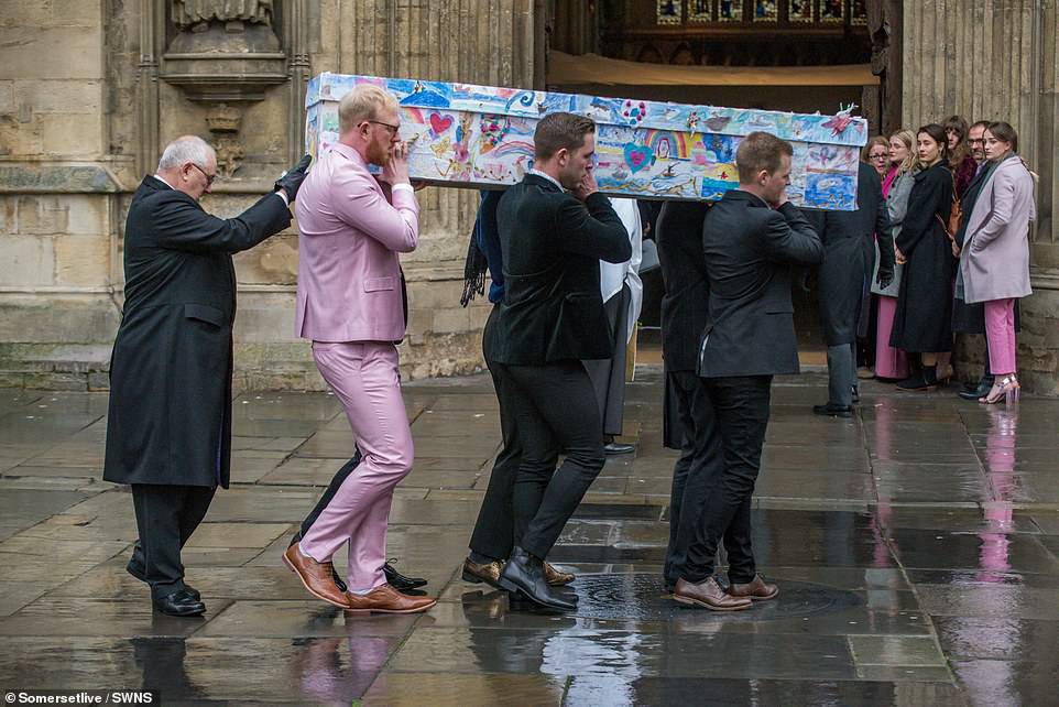 Pupils, whose art covered Mrs East's coffin, described their former head as 'fun, lovely, exotic, glittery, the best teacher, kind, caring, taught us to believe in ourselves, sprinkled fairy dust everywhere'