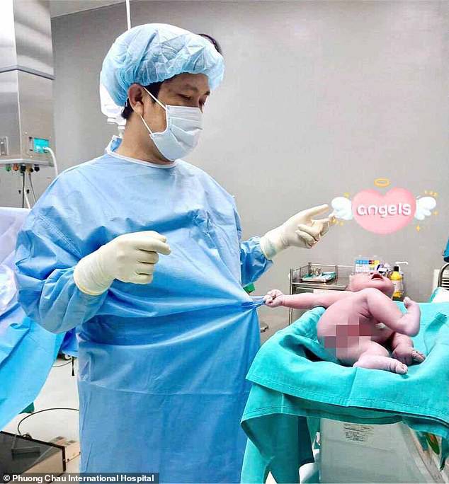 The pictures, shared by PhÂ¿Â¿ng ChÃ¢u International Hospital in Vietnam, show the crying little one firmly gripping a loop of fabric on the doctor's gown